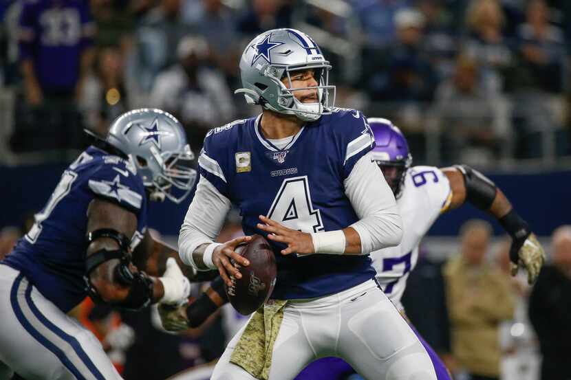 Dallas Cowboys quarterback Dak Prescott (4) fires off a pass during the first quarter of an...