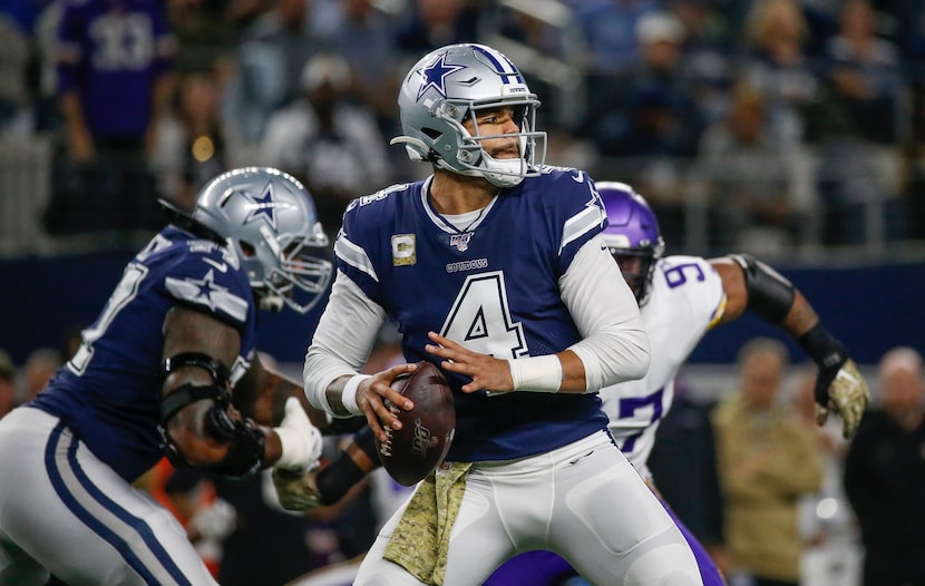 Dallas Cowboys quarterback Dak Prescott (4) fires off a pass during the first quarter of an...