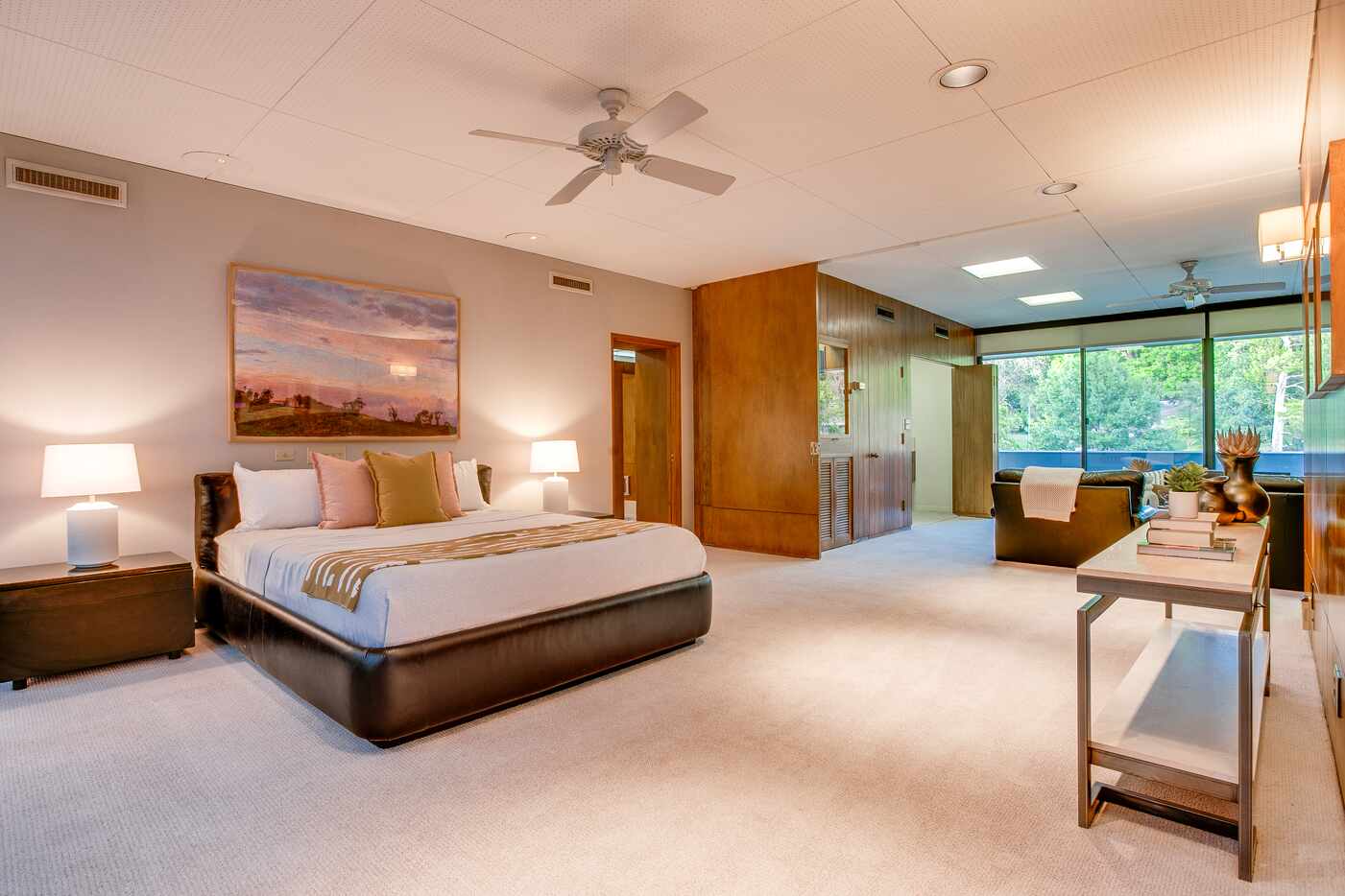 Bedroom with large bed, separate living room