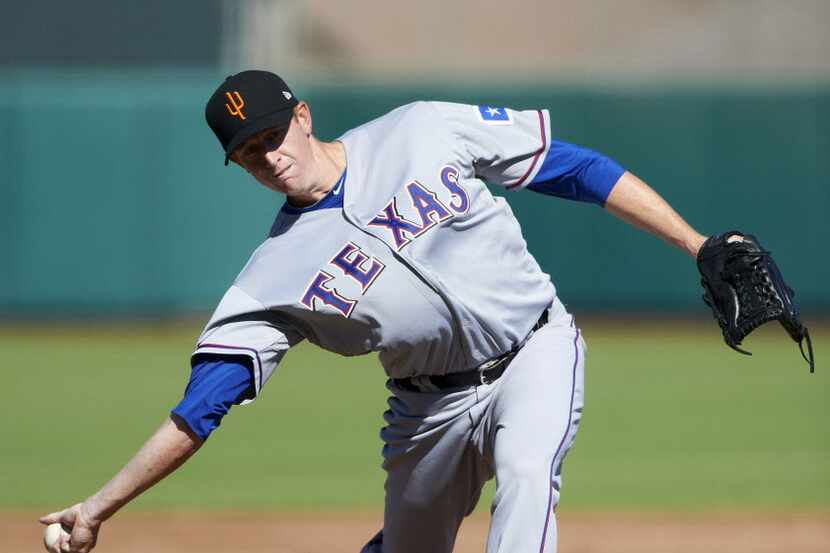 Surprise Saguaros pitcher Ben Rowen #45, of the Texas Rangers organization, during an...
