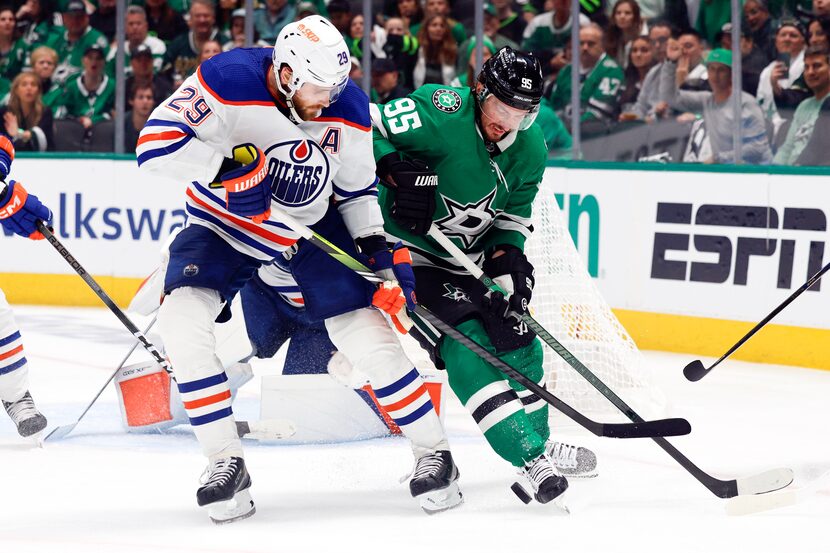 Edmonton Oilers center Leon Draisaitl (29) and Dallas Stars center Matt Duchene (95) battle...