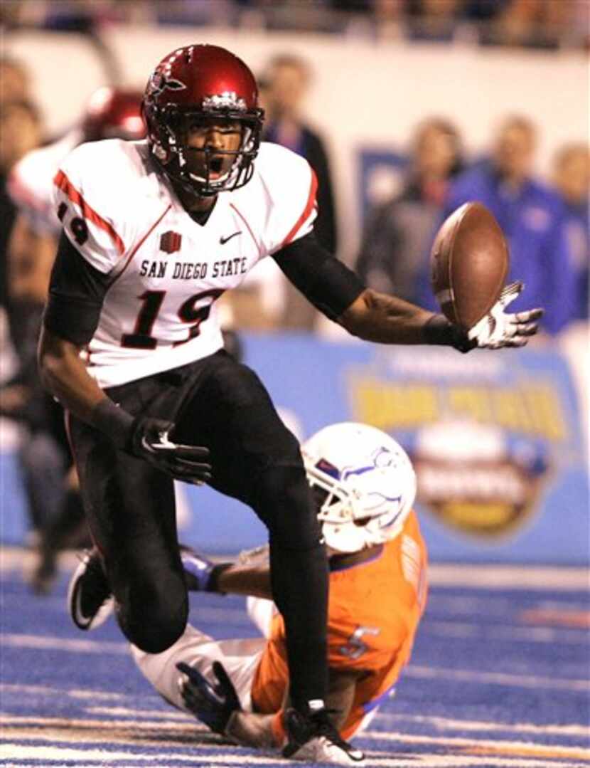 San Diego State's Brice Butler (19) goes for a reception against Boise State in an NCAA...