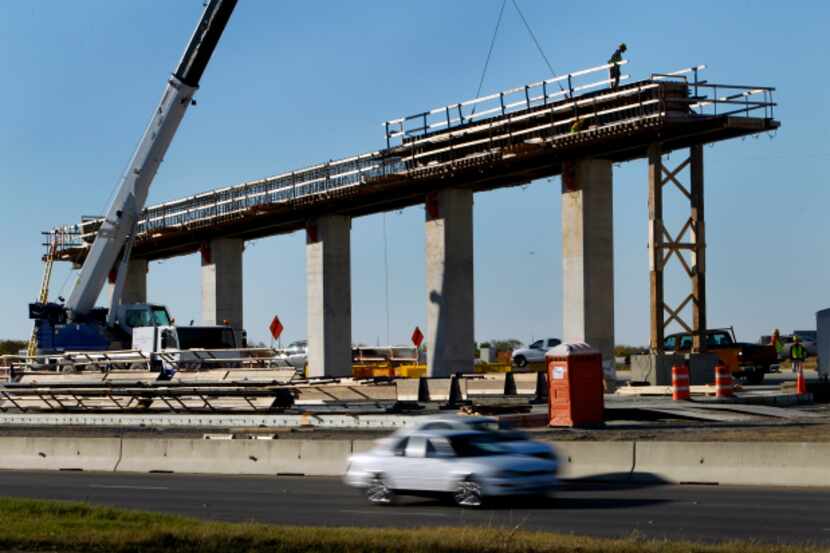 The DFW Connector, shown under construction in 2010, received more than $260 million as part...