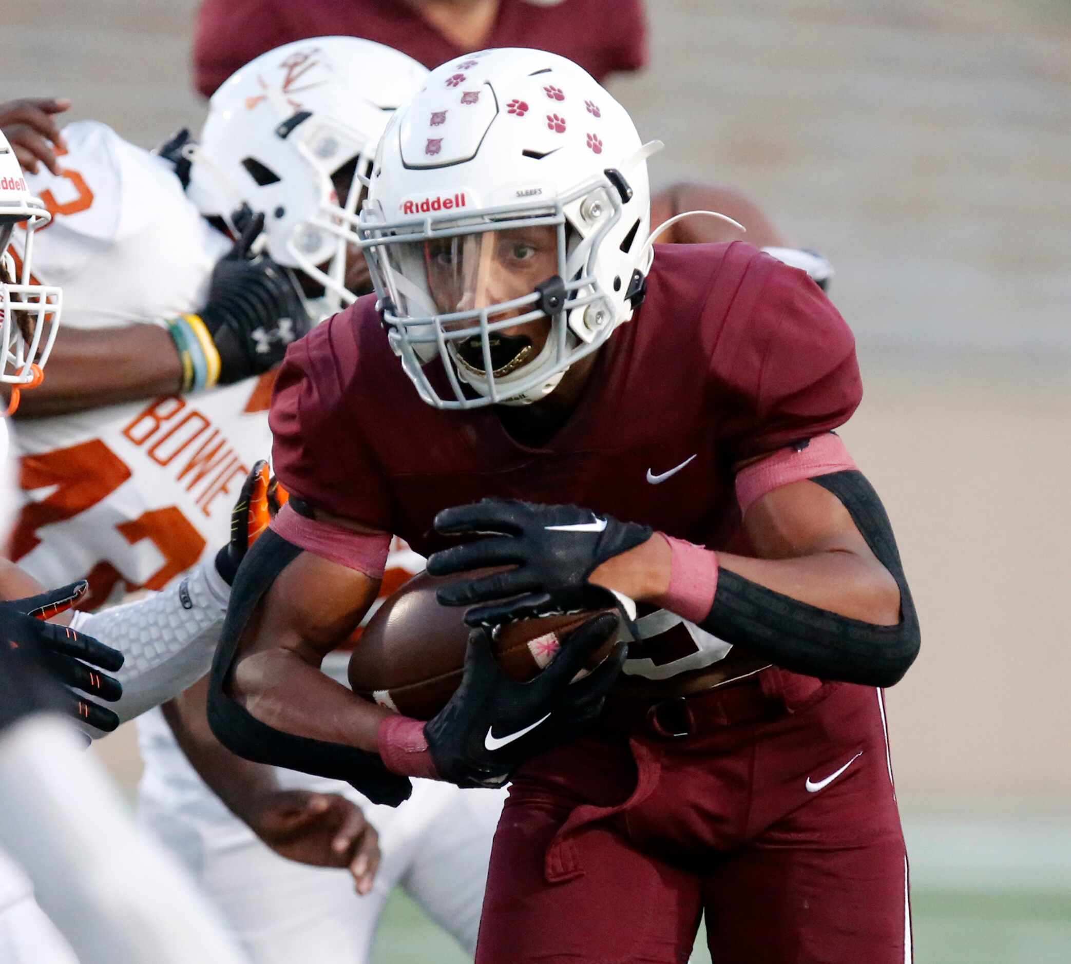 Plano Senior High School running back Joshua Campbell (15) carries the ball during the first...