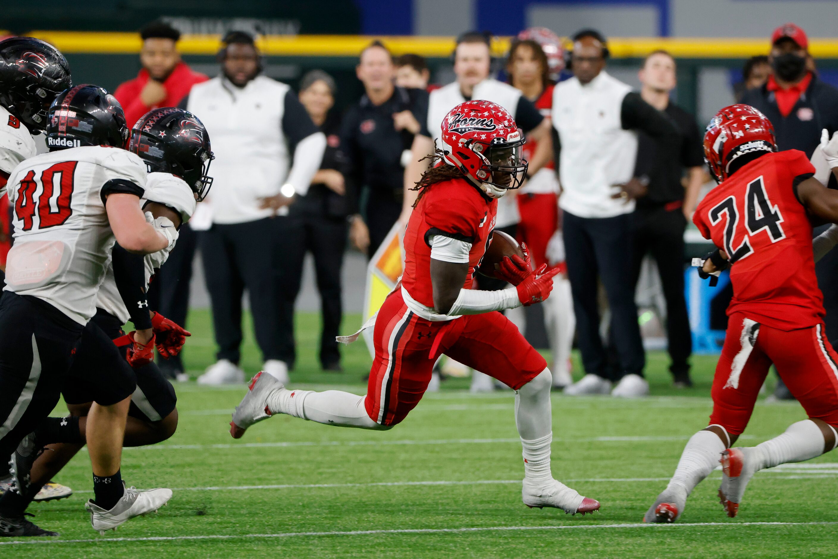 Cedar Hill running back Robert Richardson (6) runs for yardage against Tyler Legacy during...