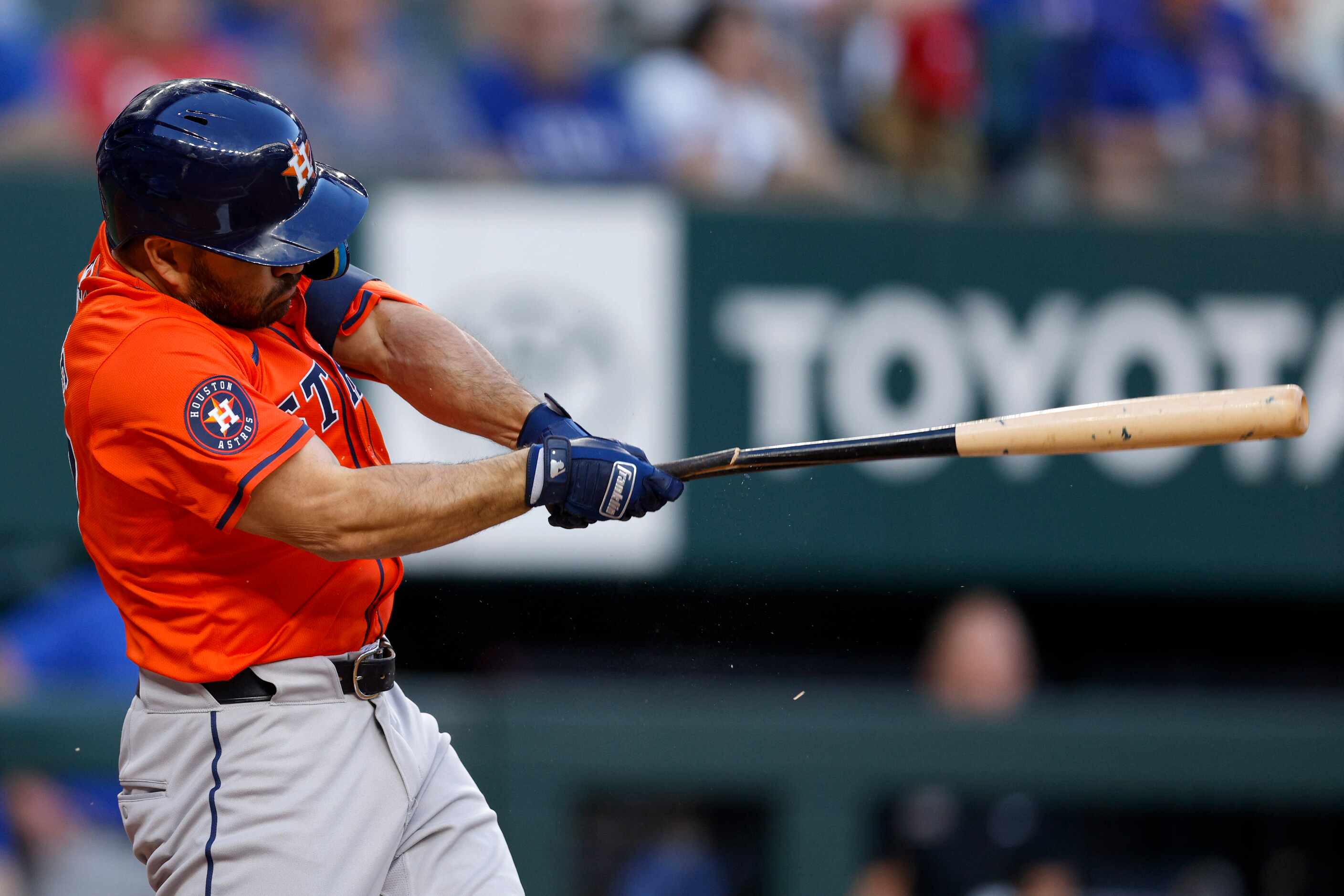 Houston Astros second baseman Jose Altuve breaks his bat on a foul ball during the third...