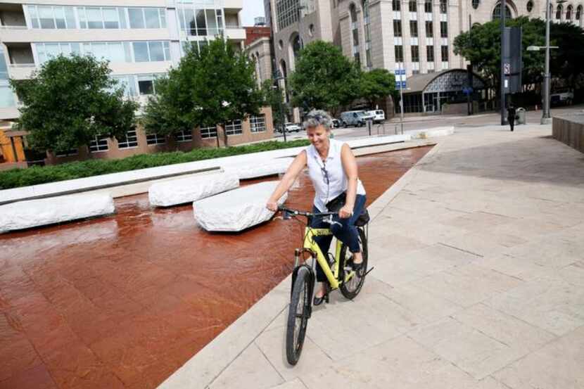 
Irene Borreskov of Copenhagen, Denmark, rode the borrowed bike of a Dallas Safety Patrol...