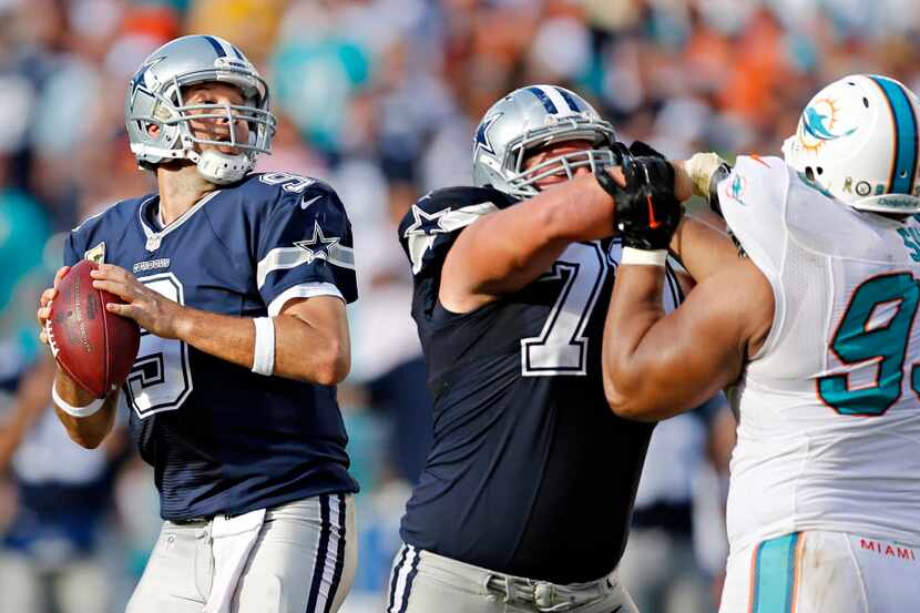 Dallas Cowboys guard Zack Martin (70) blocks Miami Dolphins defensive tackle Ndamukong Suh...