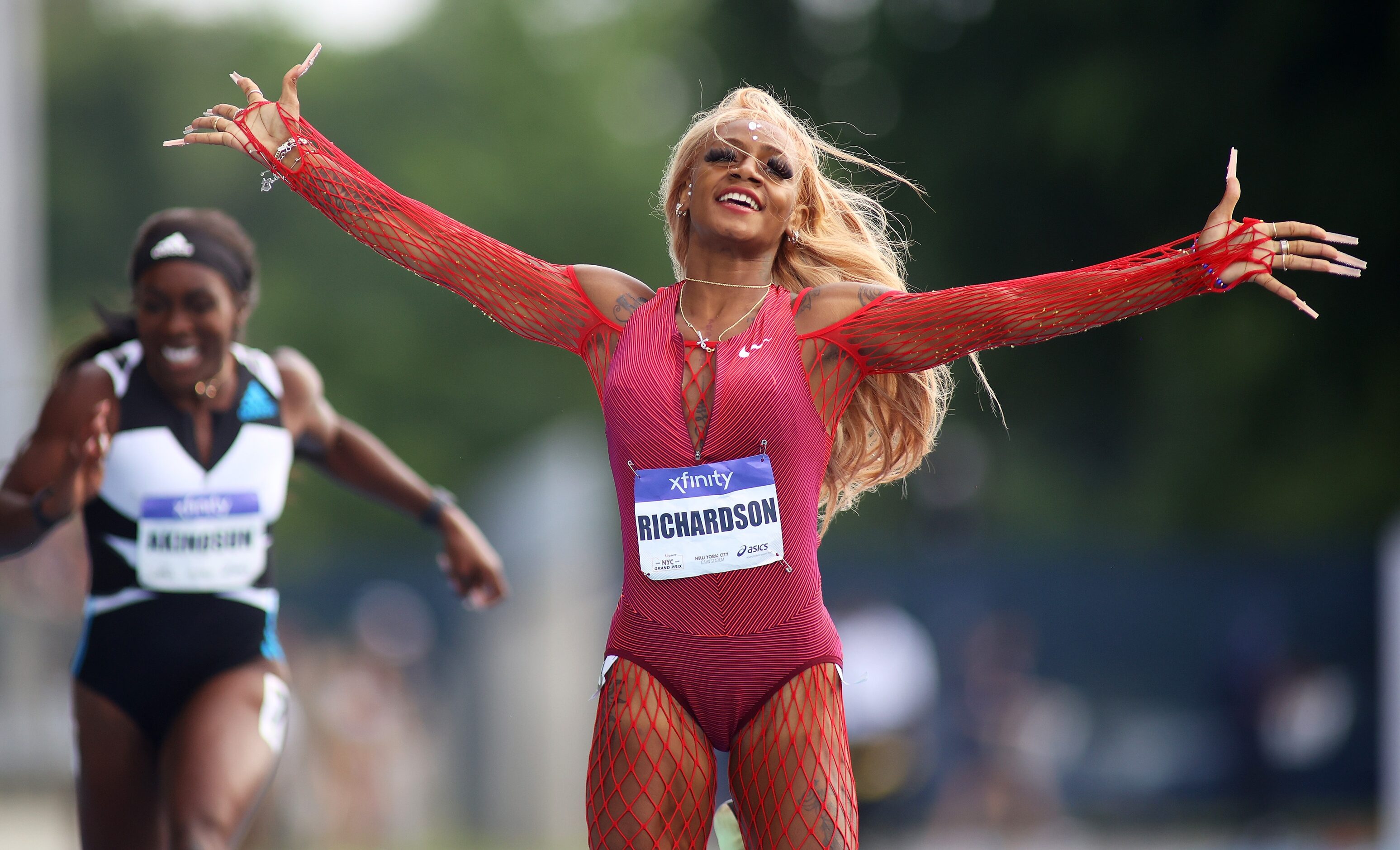 NEW YORK, NEW YORK - JUNE 12: Sha'Carri Richardson celebrates after winning the Women's 200m...