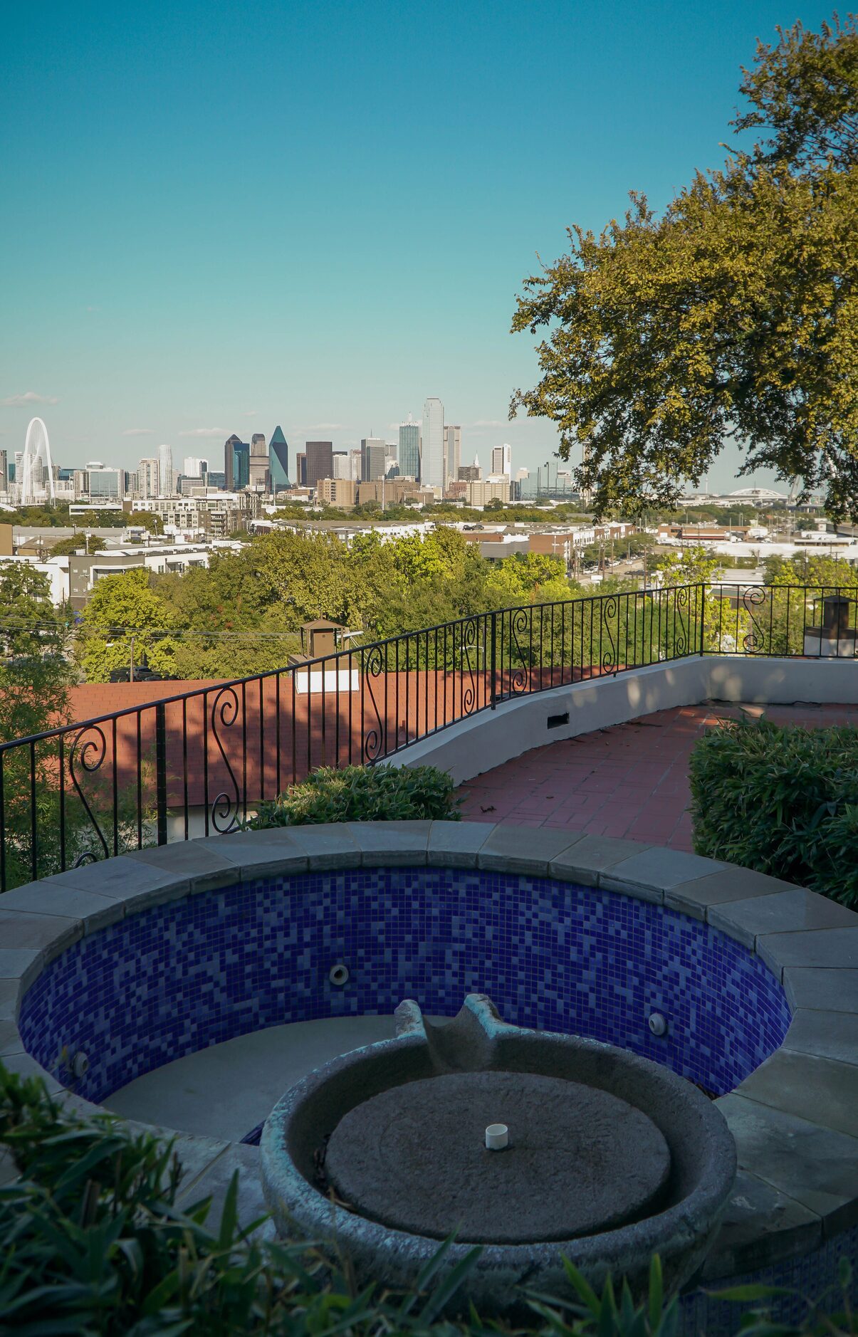 An abandoned motel in West Dallas overlooking the city's skyline.