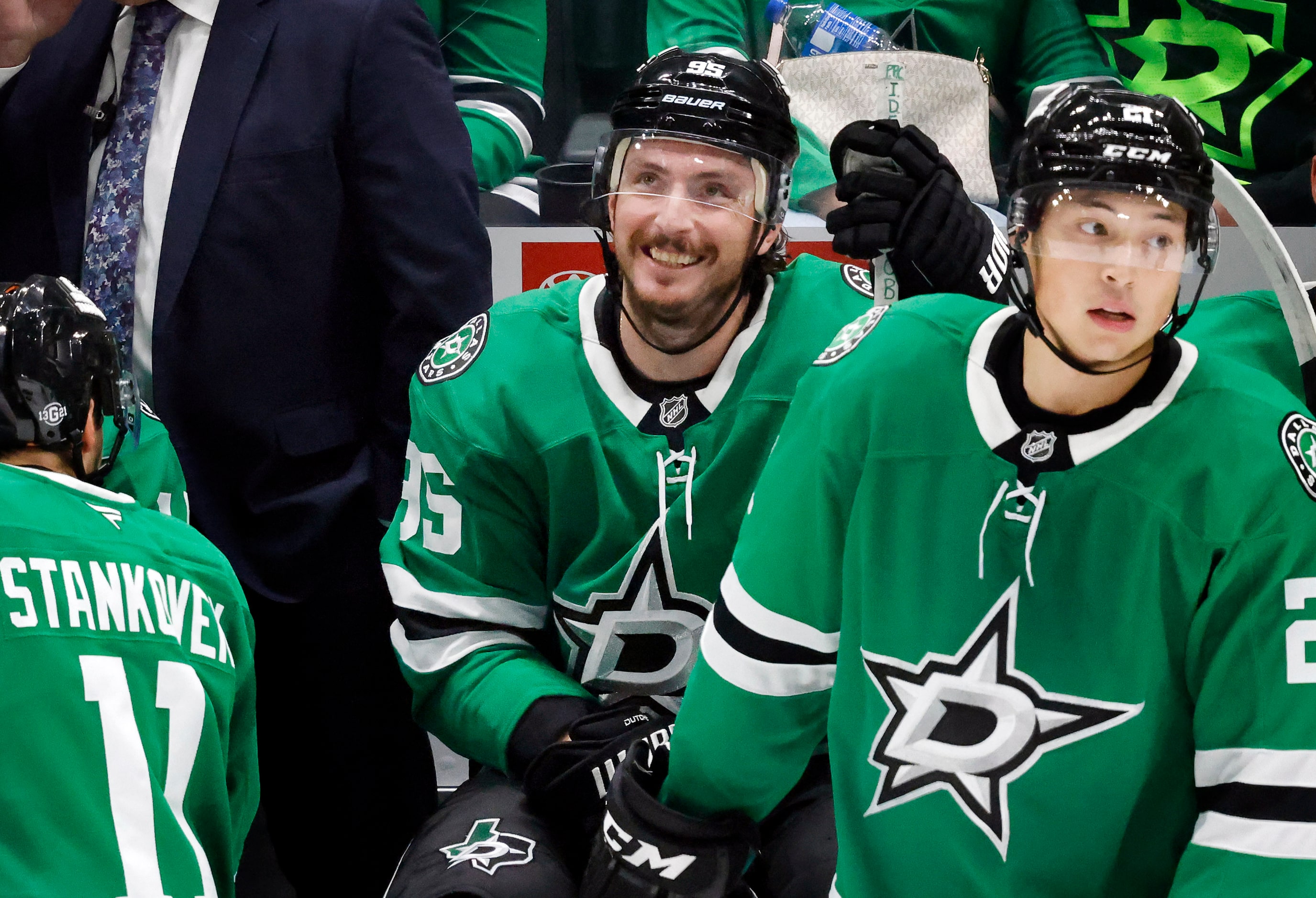 Dallas Stars center Matt Duchene (95) flashes a smile on the bench as he watches a replay of...