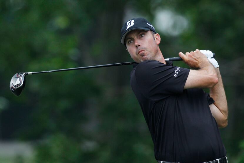 Matt Kuchar  hits from the 6th tee during the first round of the Crowne Plaza Invitational...
