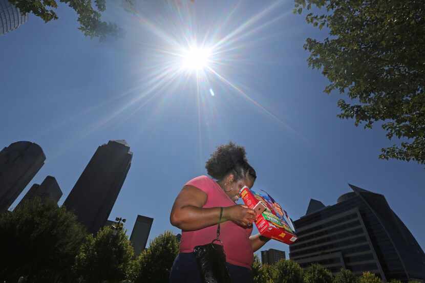 Tiffany Francis used a Lucky Charms cereal box to view the partial solar eclipse at Klyde...