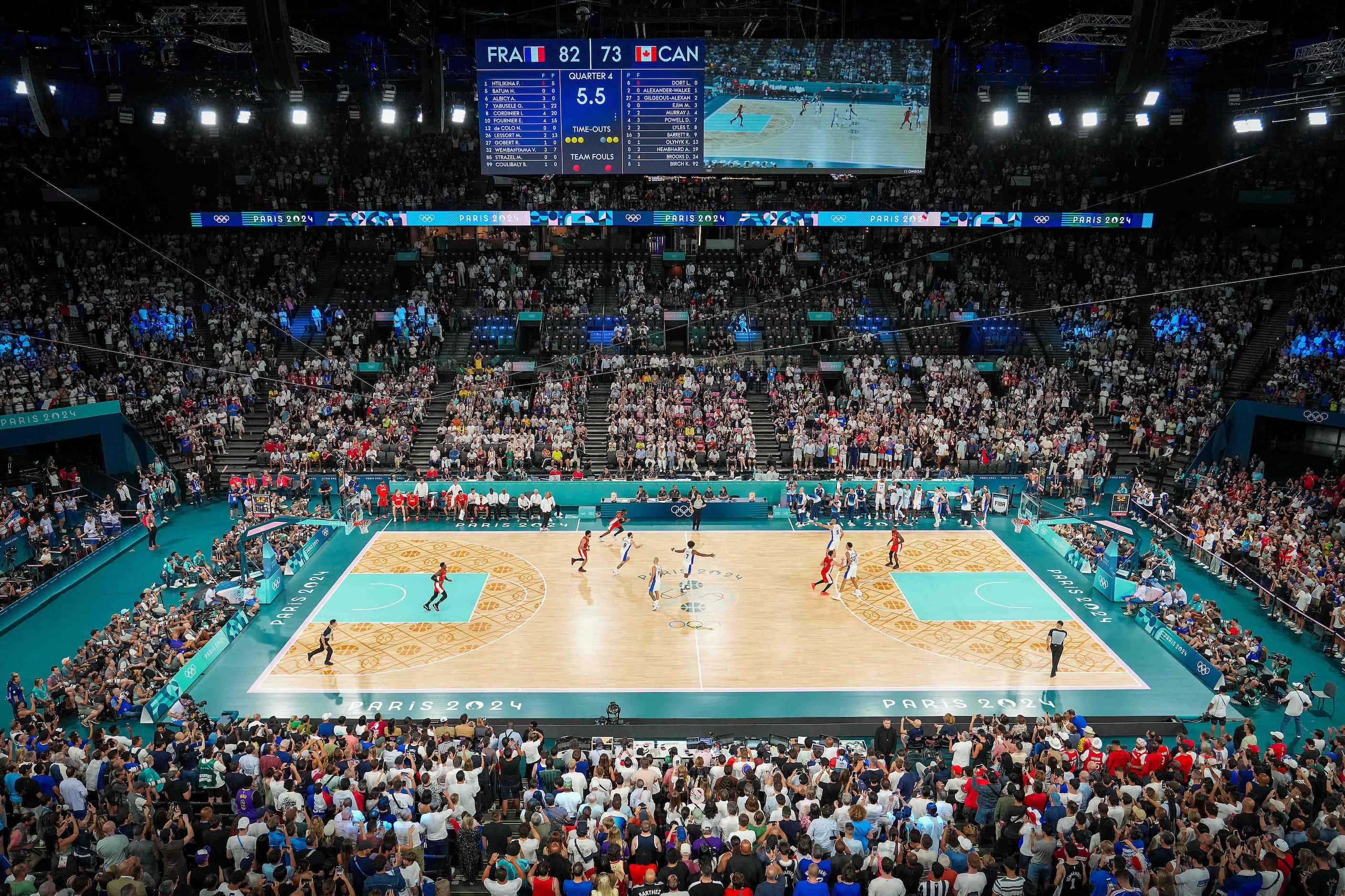 The final seconds tick away on a victory by France over Canada in a men’s basketball...