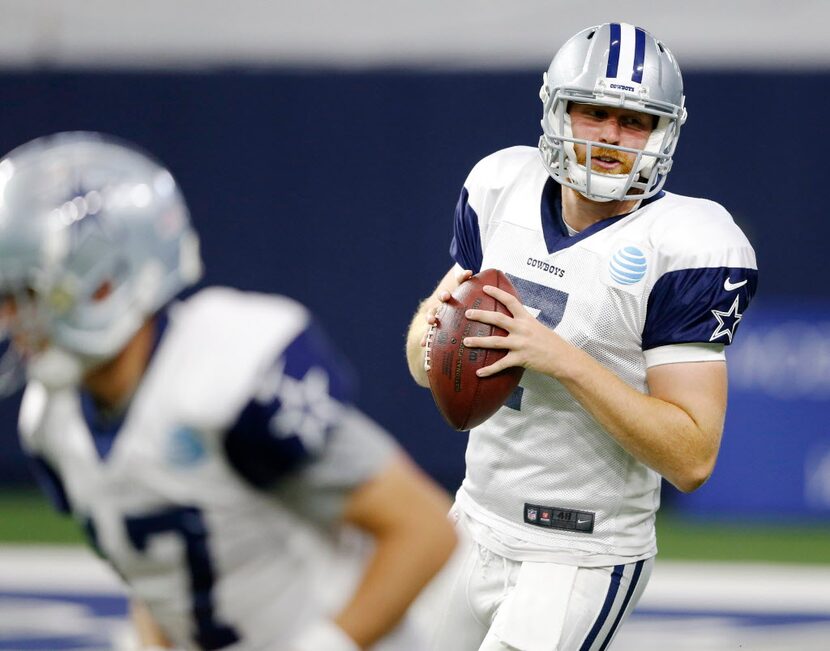 Dallas Cowboys quarterback Cooper Rush (7) and Dallas Cowboys quarterback Kellen Moore (17)...