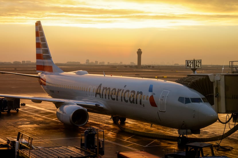 An American Airlines Boeing 737-800 sits at a gate at Terminal A at DFW International...
