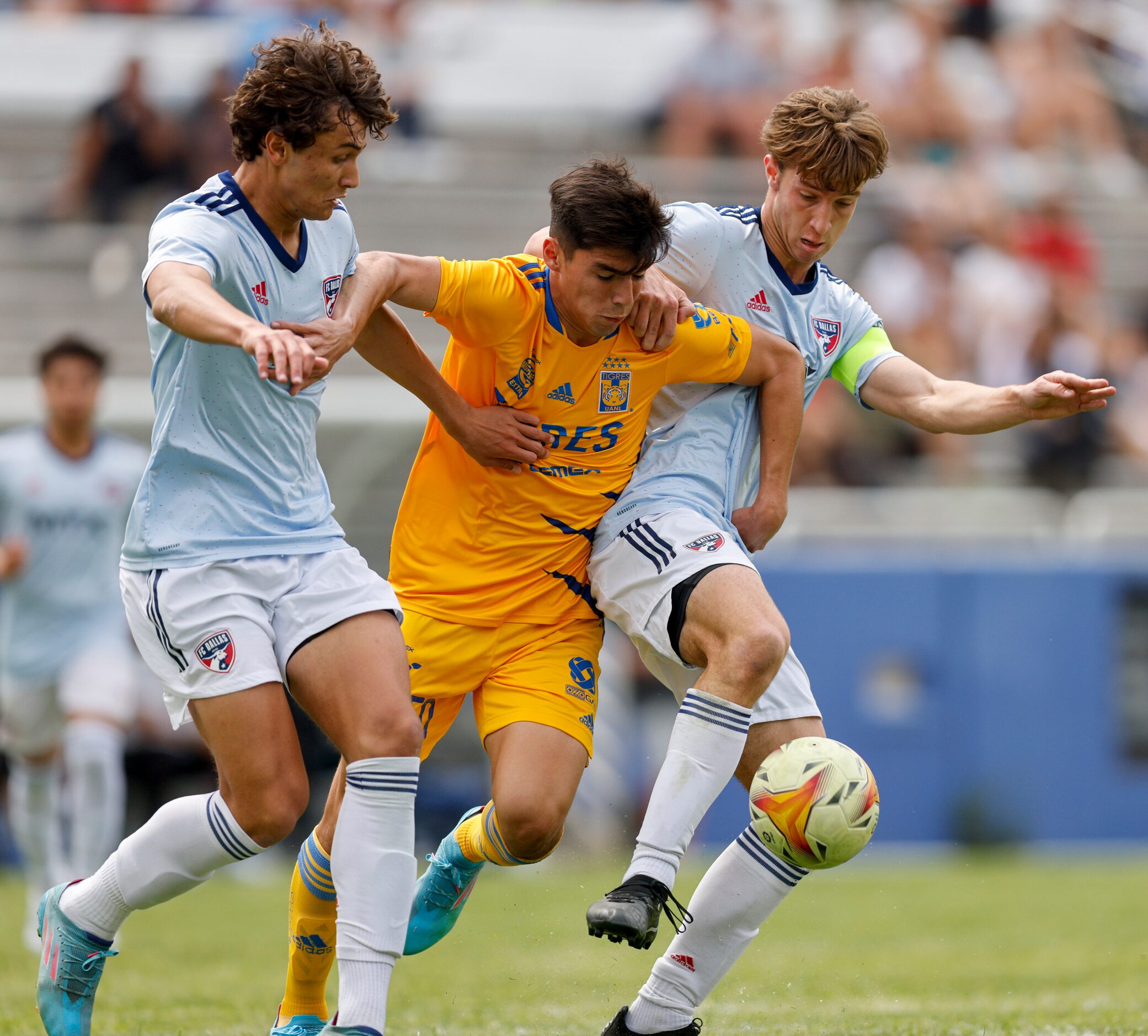 Tigres UANL forward Leonardo Alberto Flores Cisneros (250) battles for the ball with FC...