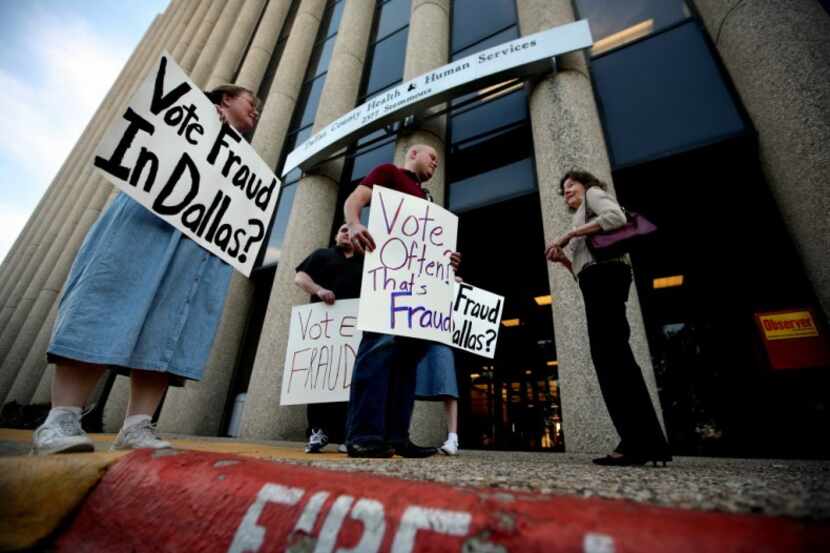  Debbie McKee, left, of Campbell, and Jarrod Atkinson, center, of Dallas, talk to a passerby...