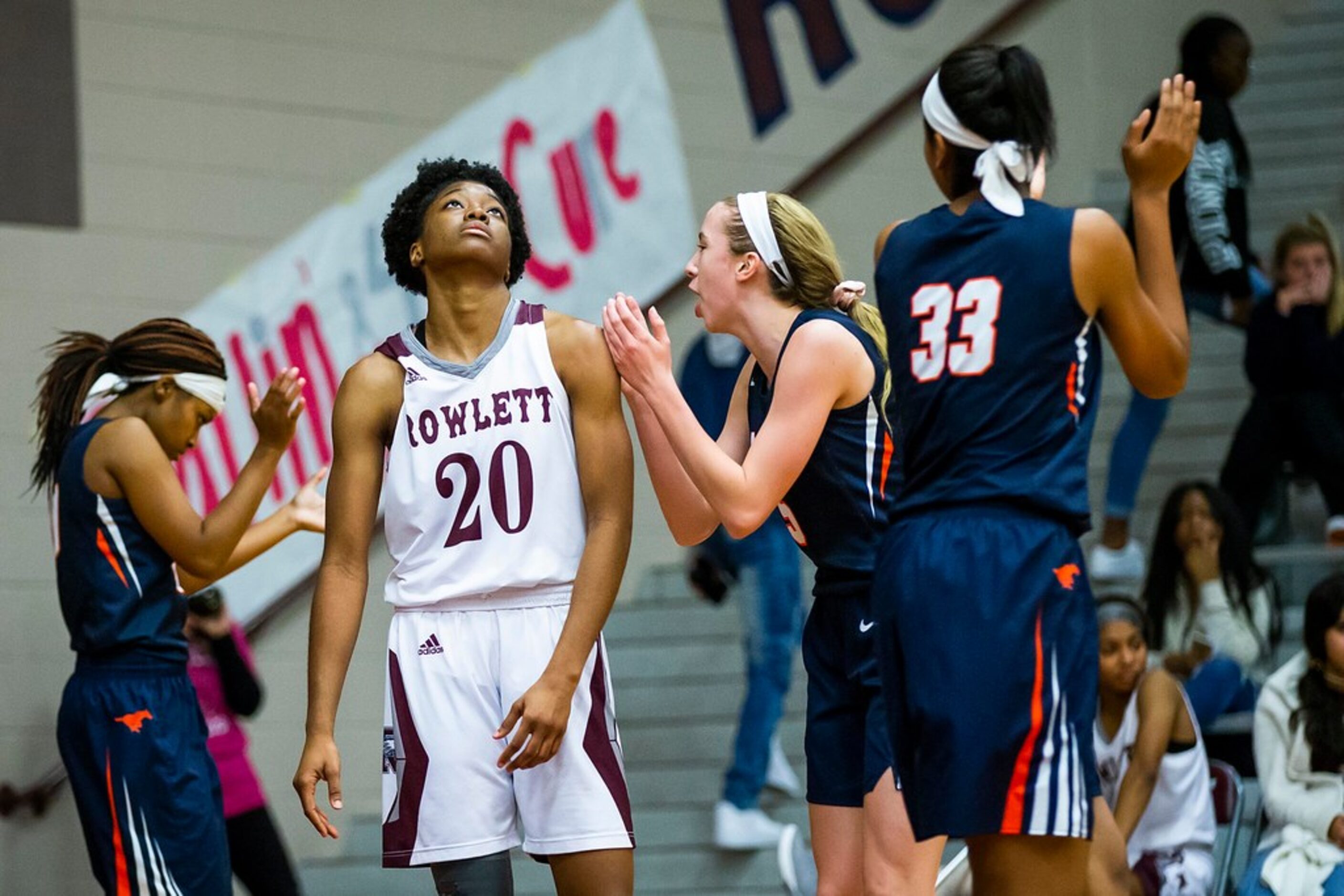 Rowlett forward Ngozi Obineke (20) reacts after being called for a foul as Sachse's Kayla...