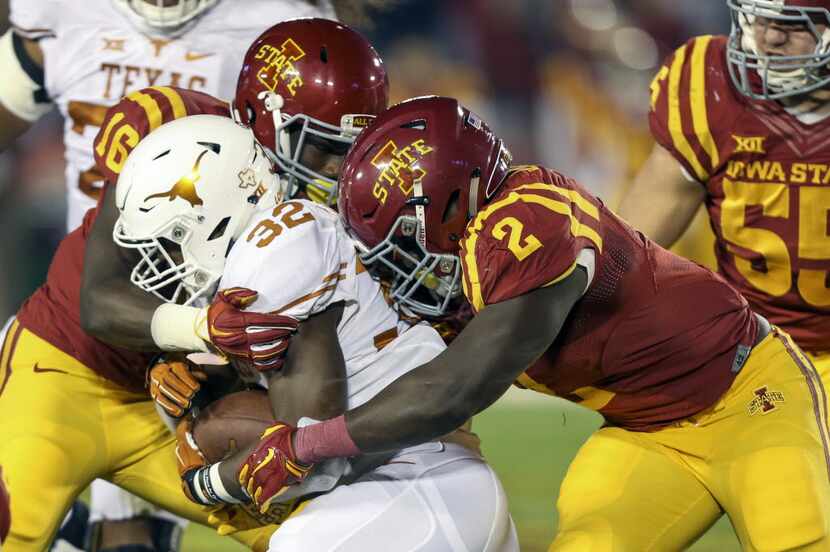 FILE - In this Oct. 31, 2015, file photo, Iowa State linebackers Jordan Harris (2) and...