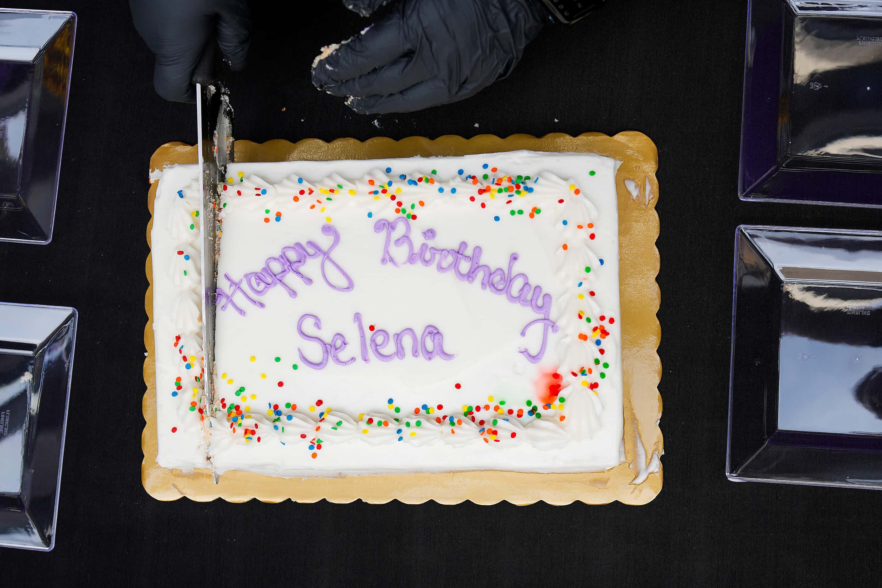 A birthday cake for singer Selena Quintanilla is cut during a Selena Day celebration at the...