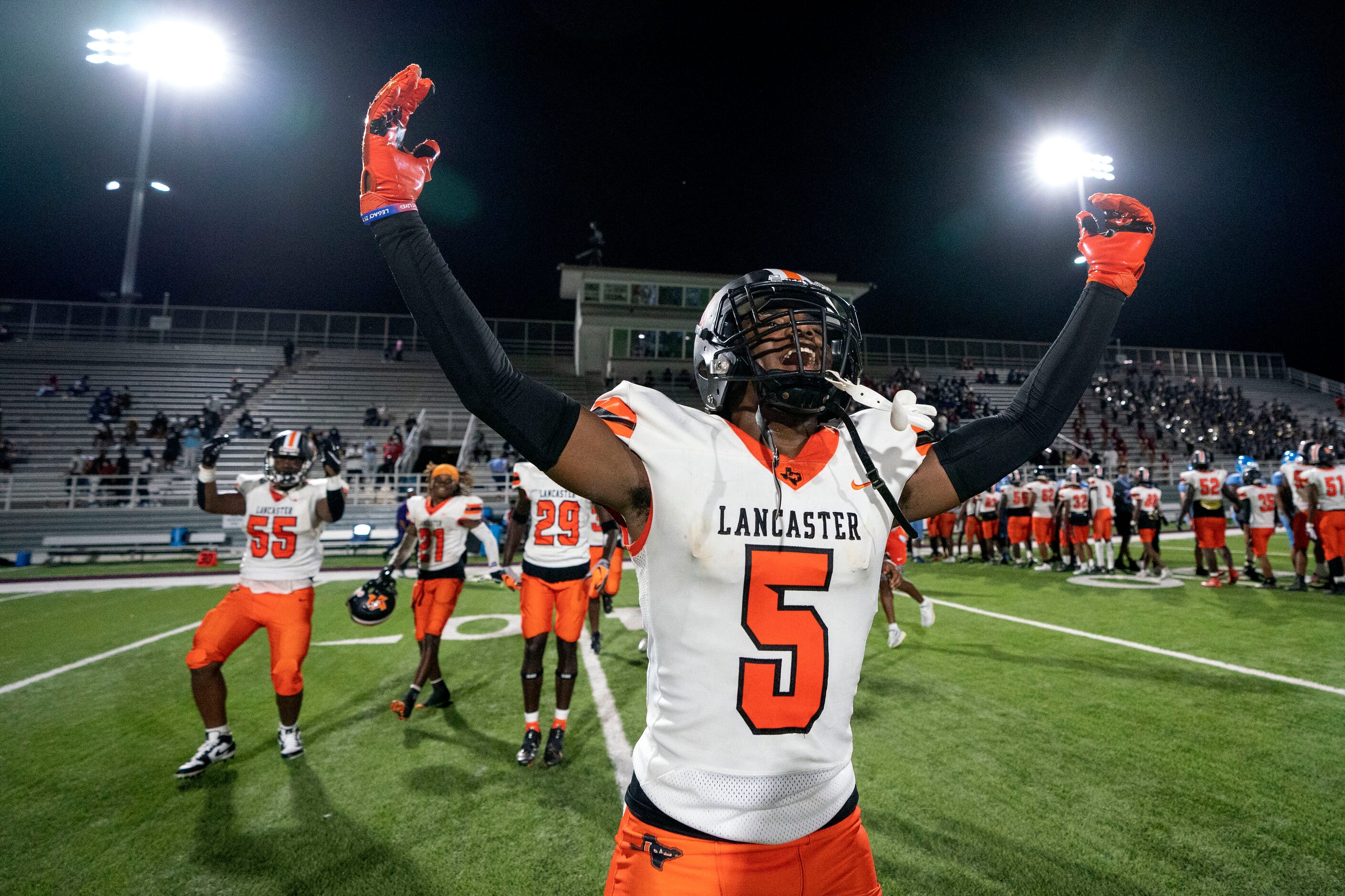 Lancaster defensive back Ejae Moten (5) celebrates his team’s 16-0 victory over Skyline in a...