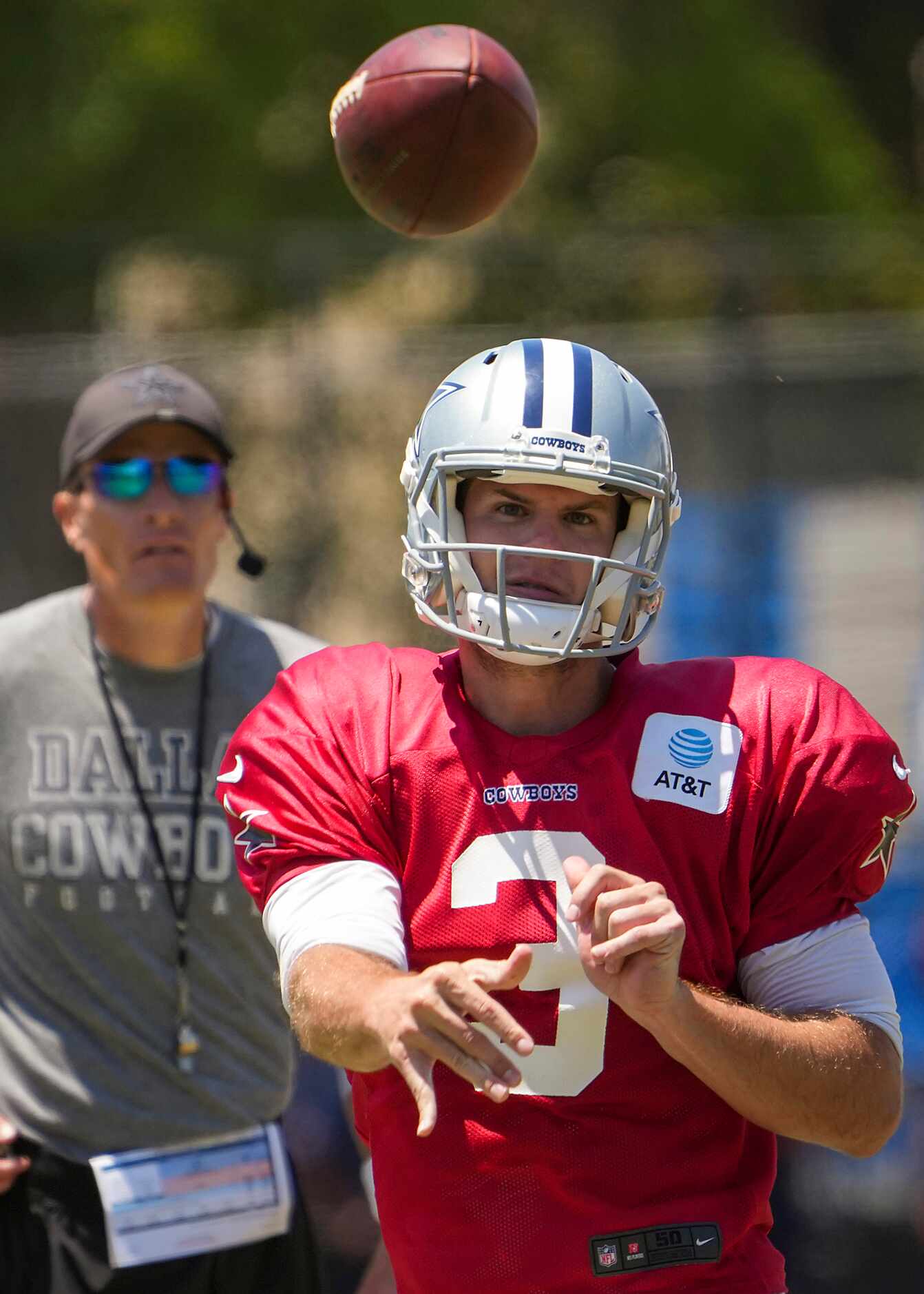 Dallas Cowboys quarterback Garrett Gilbert (3) throws a pass during a practice at training...