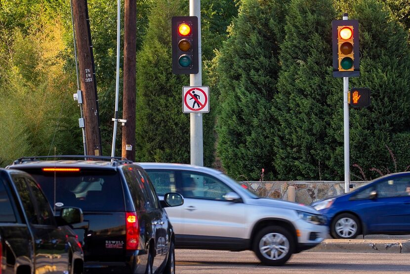 The northbound exit ramp from the Dallas North Tollway dead-ends into a stoplight at Walnut...