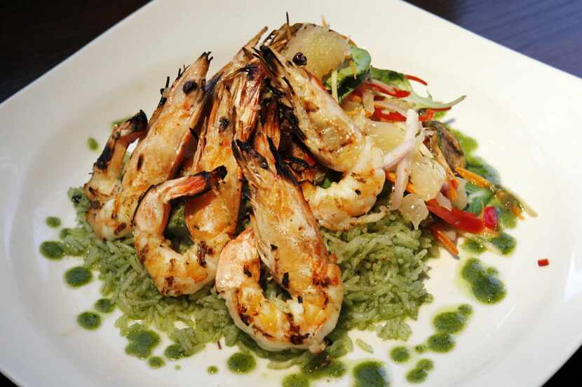 Here are grilled tiger prawns: coconut-marinated Texas Gulf prawns with pomelo salad and...