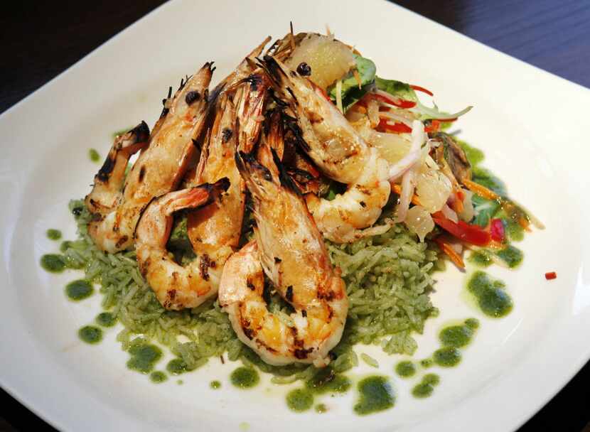 Here are grilled tiger prawns: coconut-marinated Texas Gulf prawns with pomelo salad and...