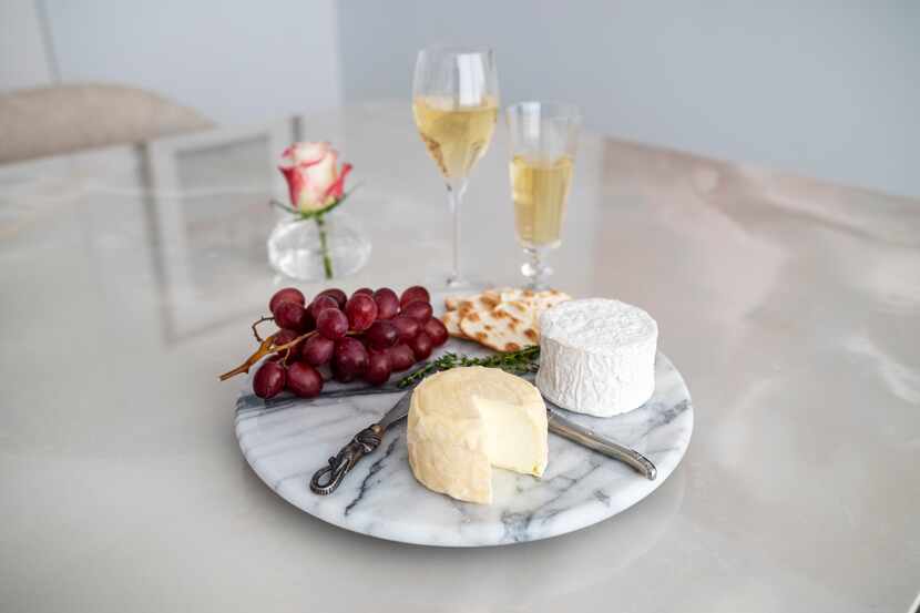 Haute Goat's Chaource, made in Longview, bottom center, and Cowgirl Creamery Mt. Tam triple...