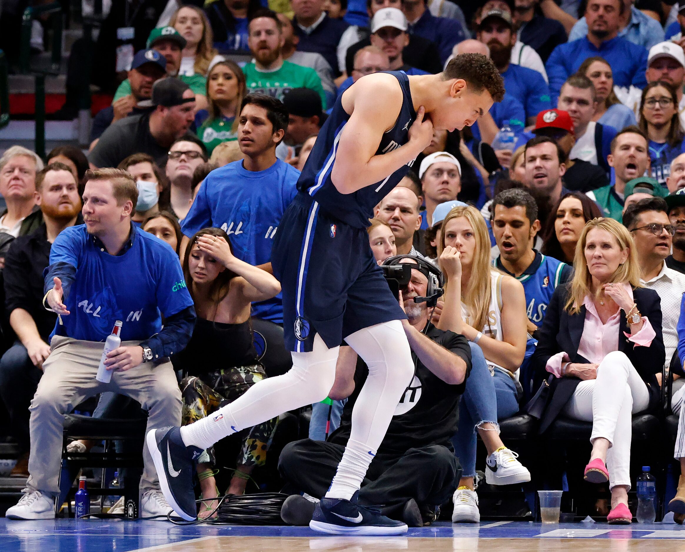 Dallas Mavericks center Dwight Powell (7) reacts after being fouled by the Utah Jazz during...