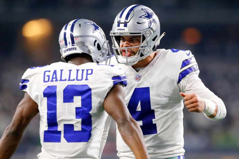 Dallas Cowboys wide receiver Michael Gallup (13) is congratulated on his second quarter...