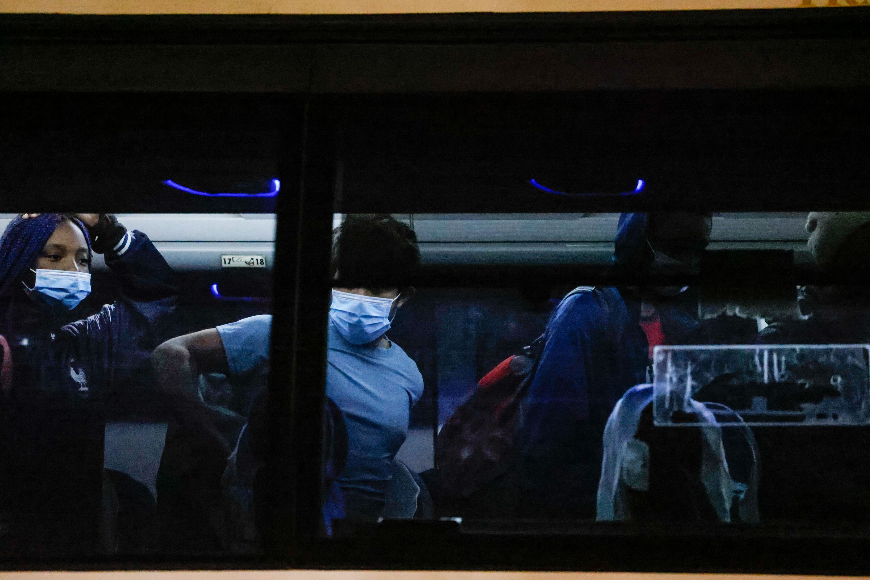 Victor Rodriguez, 26, prepares to disembark the bus that took him along with a group of...