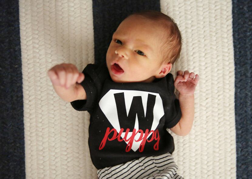 Meet Watchdog Baby Nicholas Thrift, here 9 days old. His mother dressed him up in gratitude...