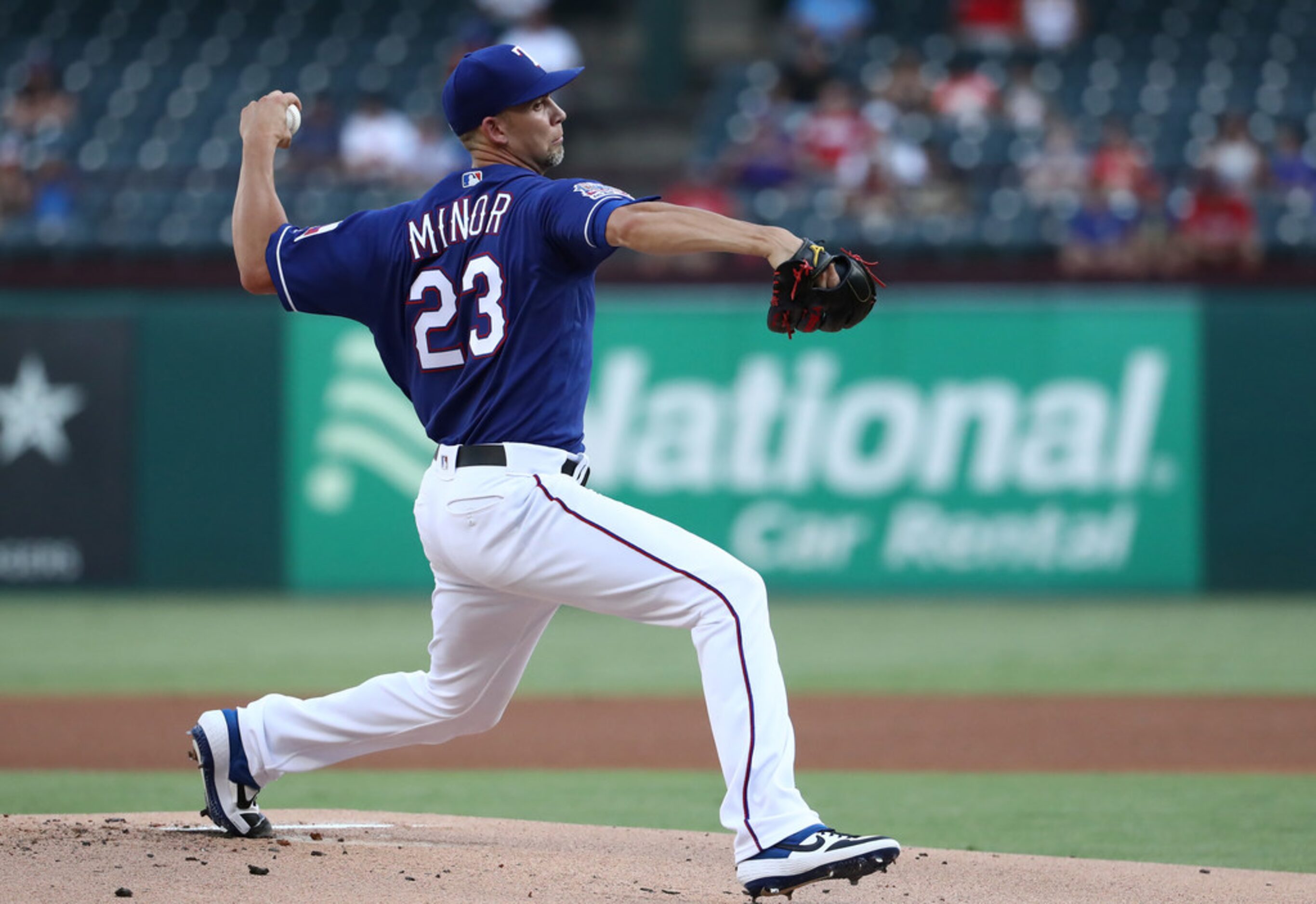 ARLINGTON, TEXAS - AUGUST 21:  Mike Minor #23 of the Texas Rangers throws against the Los...