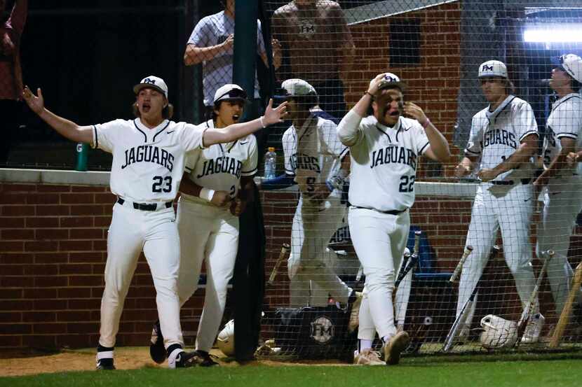 Flower Mound’s players including Mason Arnold (23) and Creed Thomas (22) celebrate their win...