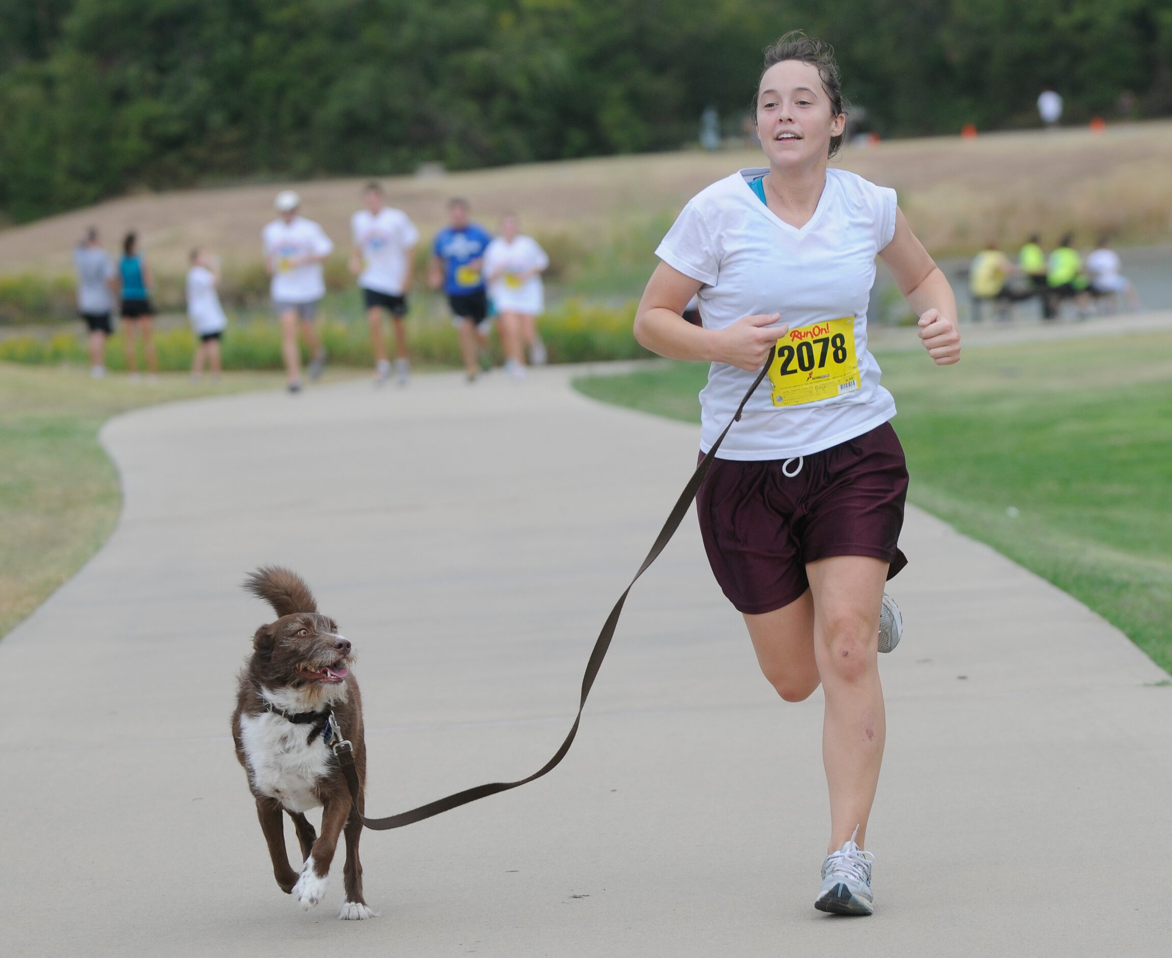 Franze Eberhardt finishes the CiCi's Pizza Barefoot Run in Coppell.