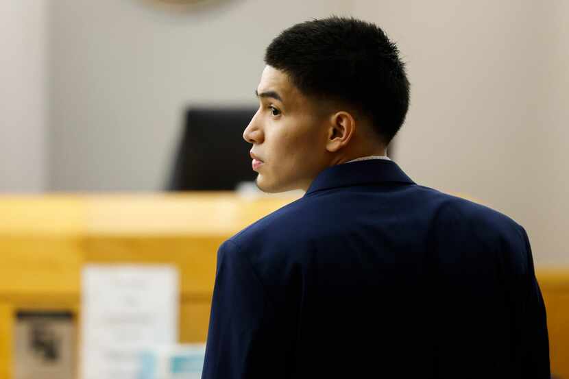 Luis Espinosa looks as he enters the courtroom ahead of a capital murder trail on Tuesday,...