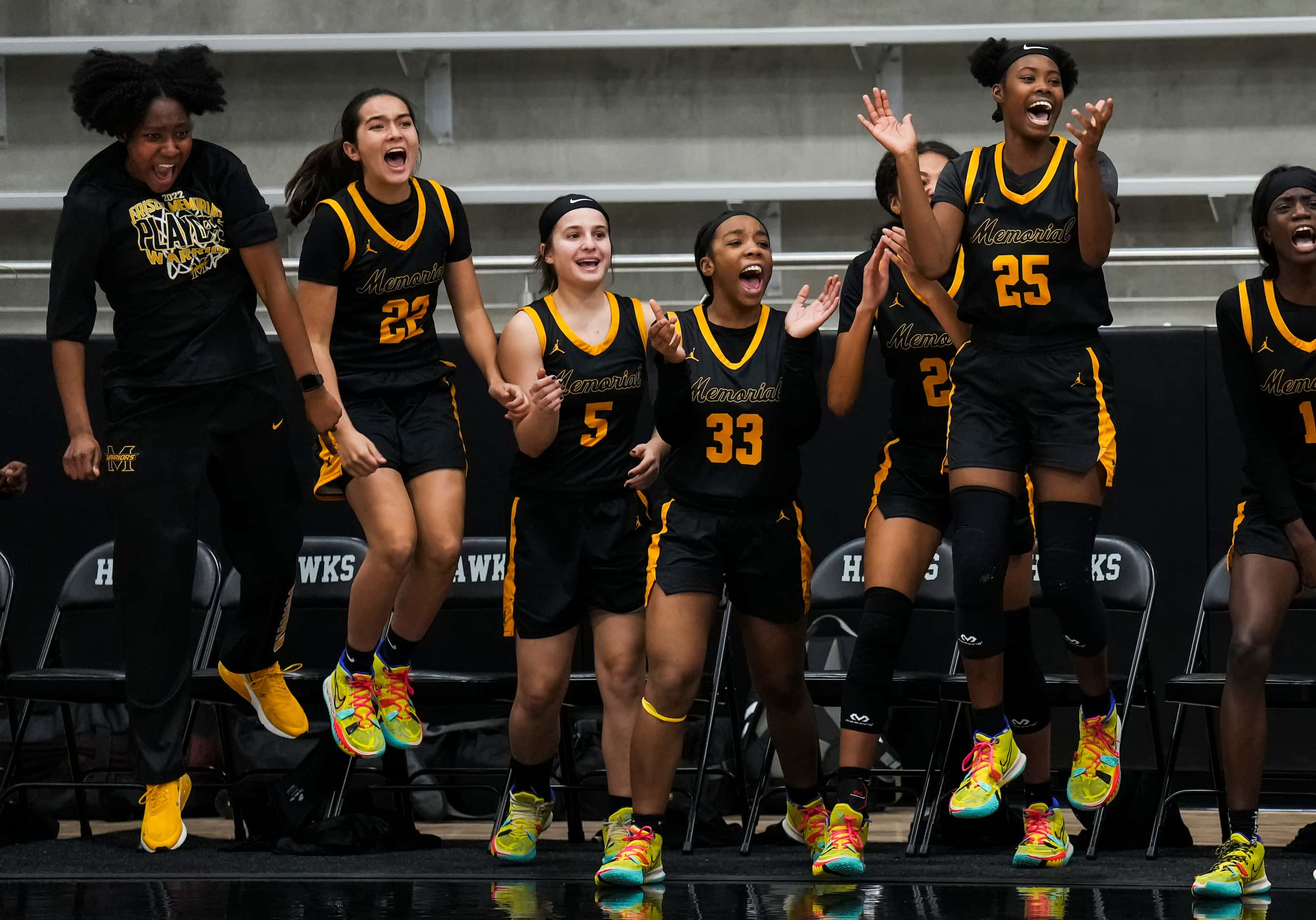 Frisco Memorial players celebrate on the bench as time expires on a 44-42 victory over Wylie...