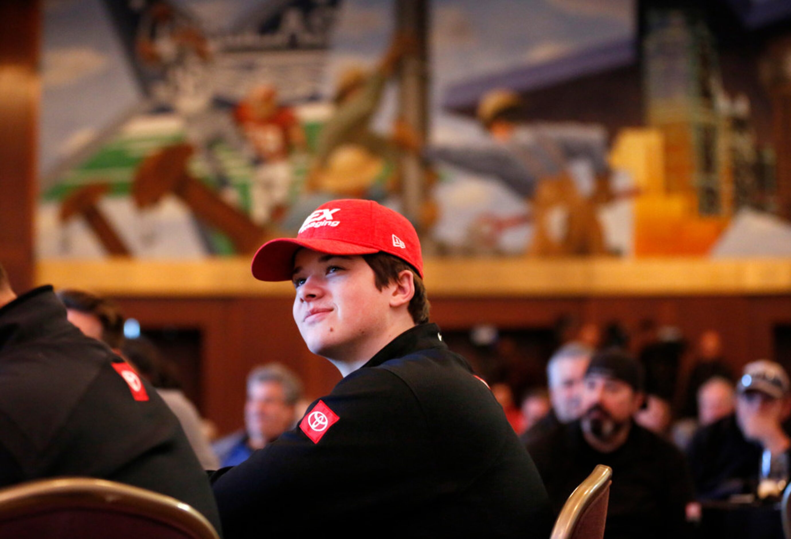 NASCAR Xfinity driver Harrison Burton, 19, son of former driver Jeff Burton, listens to...