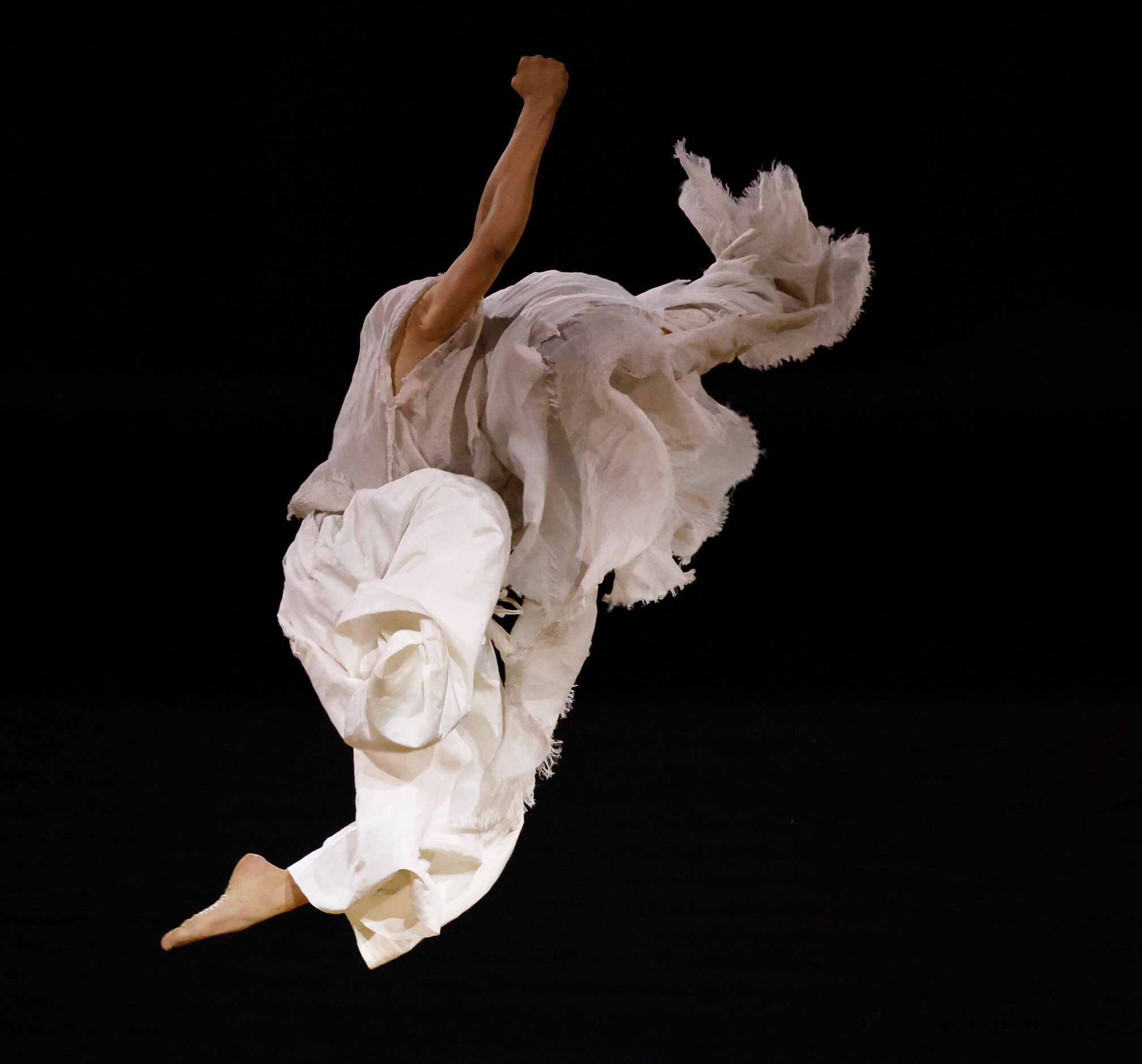 A dancer performs during the opening ceremony for the postponed 2020 Tokyo Olympics at...