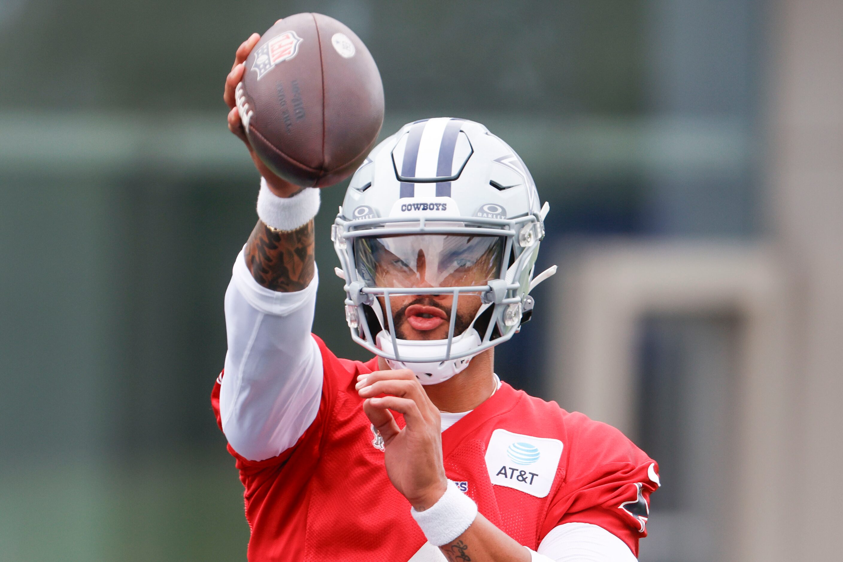 Dallas Cowboys quarterback Dak Prescott (4) throws the ball during a team practice, on...