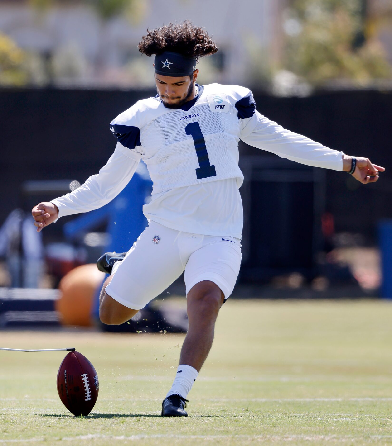 Dallas Cowboys kicker Lirim Hajrullahu (9) kicks field goals during training camp practice...