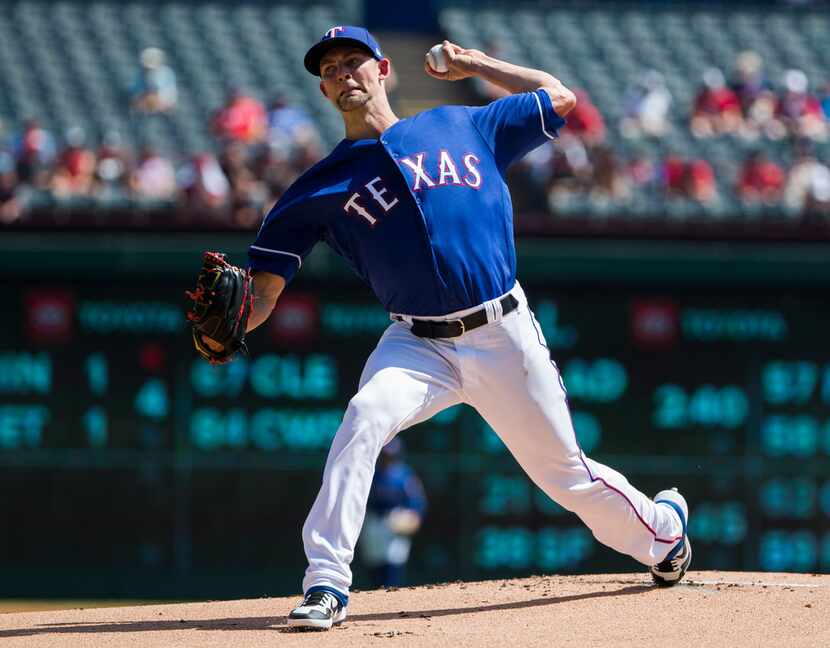 Texas Rangers starting pitcher Mike Minor (23) pitches during the first inning of an MLB...
