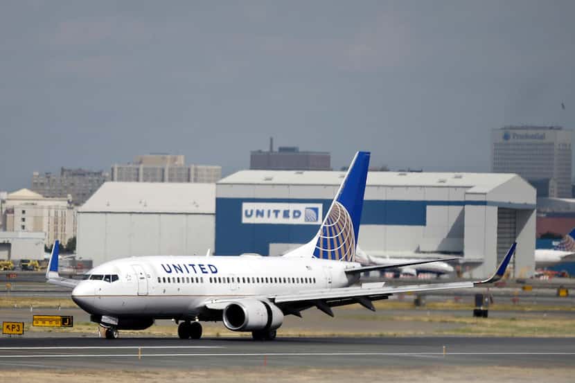 FILE - In this Sept. 9, 2015, file photo, a United Airlines jet lands at Newark Liberty...