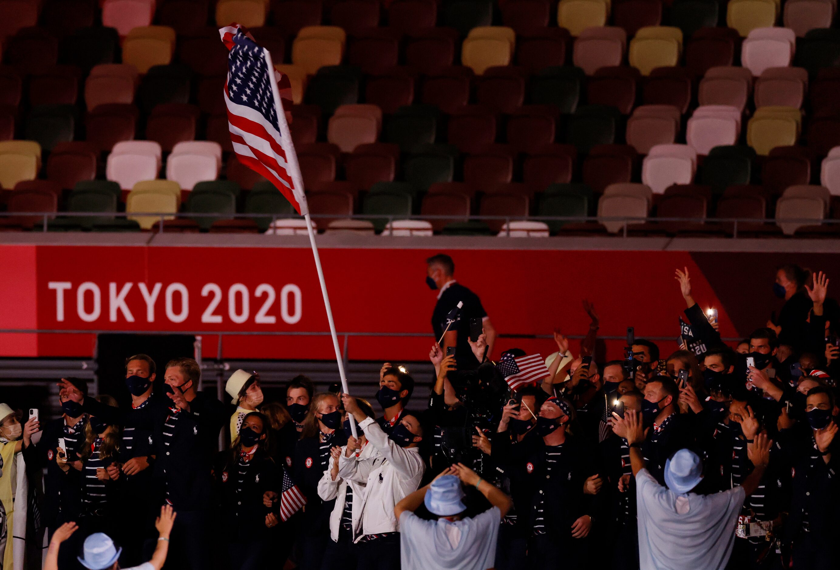 Team USA makes their way across the stage during the introduction portion of the opening...