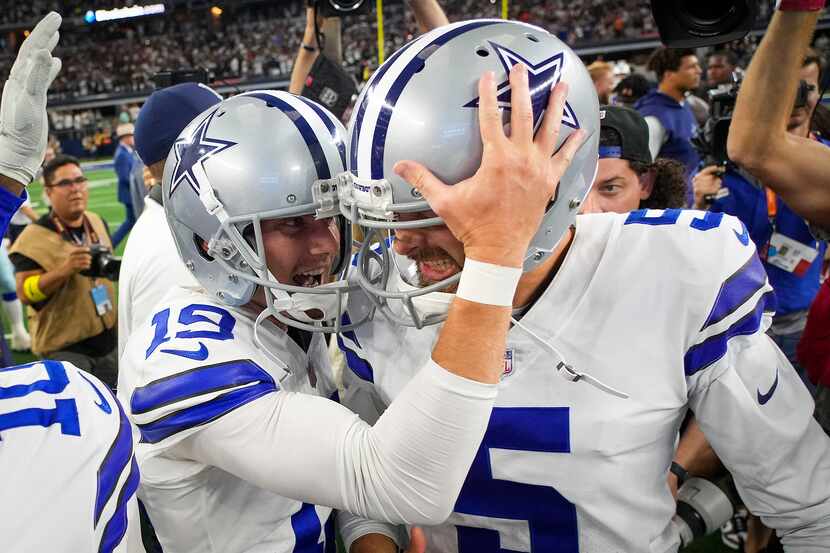 Dallas Cowboys place kicker Brett Maher (19) celebrates with punter Bryan Anger (5) after...