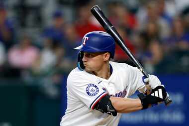 Texas Rangers shortstop Corey Seager (5) takes an at bat during the sixth inning against the...