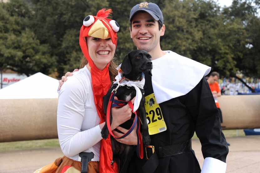 Cynthia Webber, Grant Schmidt and their newly adopted black lab Reagan raced in the 5K at...